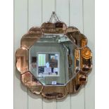 Art Deco tinted glass flower head shaped mirror, 61cm.