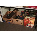 Collection of tools including saws, Power Devil pack, table saw, mallet, etc.