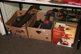 Collection of tools including saws, Power Devil pack, table saw, mallet, etc.