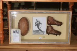 Johnny Lujack vintage ball and books in display cabinet (American Football interest).