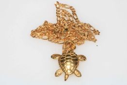 18 carat yellow gold turtle pendant on 18 carat gold link chain, chain length 58cm.