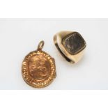 9 carat gold Masonic ring and locket.