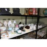 Collection of decorative porcelain, mantel clock, part teawares, glass, cased doll, prints, etc.