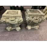 Pair weathered concrete lion mask garden planters, 33cm by 33cm by 33cm.