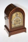 Vintage mahogany inlaid mantel clock with ornate gilt face, 33cm high.