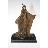 Art Deco style bronze of figure in gown on marble plinth, 34cm high.