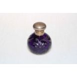 Purple glass perfume bottle with etched floral decoration and silver top, Birmingham 2002.