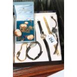 Assorted jewellery including cameo brooches and five ladies wristwatches.