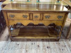 Titchmarsh & Goodwin style oak three drawer potboard dresser, 76cm by 117cm by 40cm.