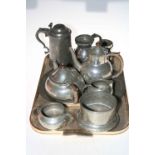 Five piece pewter tea set, tankard, measure, stein, bottle holder, etc.