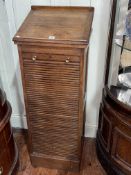 Early 20th Century oak easel topped tambour front filing cabinet, 108cm by 44.5cm by 40cm.