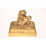 Victorian gilt bronze of dog and child on marble plinth.