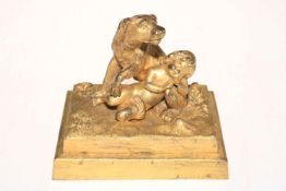 Victorian gilt bronze of dog and child on marble plinth.