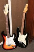 Two electric guitars including Zennox and Encore.