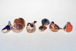 Six Crown Derby paperweights including Robin, Goldfinch, etc.