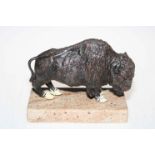 Metal cold painted model of an American Bison on marble stand.