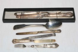 Silver handled knife and fork, two small silver knives and fork, George IV Irish silver spoon,
