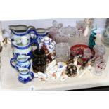 Blue and white porcelain jugs, cut glass, figurines, etc.