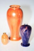 Orange glazed Ruskin vase and two Wilkinsons vases (3).