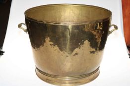 Vintage beaten brass two handled log bucket, 40cm high.