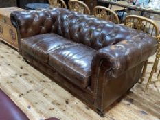 Artsome for Coach House tan buttoned leather two seater Chesterfield settee.