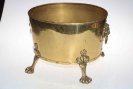 Brass claw feet coal bin, 30cm high.