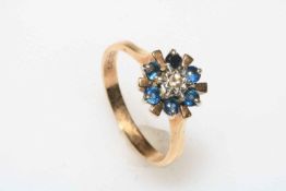 Sapphire and diamond petal head design cluster ring in 9 carat yellow gold, size Q.