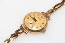 Ladies 9 carat gold Accurist bracelet wristwatch.