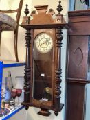 Victorian walnut Vienna style wall clock with enamelled dial.