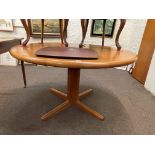 Teak circular extending dining table and two leaves, and teak tea tray labelled Go Gay, Sweden (2).