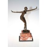 Art Deco style bronze of dancing lady on marble plinth, 65cm high.