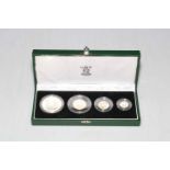 The Royal Mint United Kingdom 1997 silver proof Britannia four coin collection, cased.