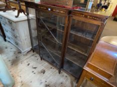 Edwardian inlaid mahogany breakfront bookcase with astragal glazed central door,