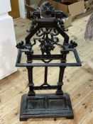 Cast iron arched top stick stand, 85cm by 43cm by 21cm.