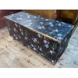 Floral painted pine trunk, 57cm by 124cm by 52cm.