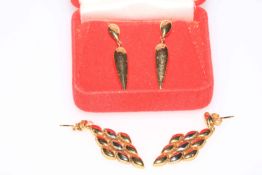 Two pairs of gold earrings, testing as 18 and 14 carats.