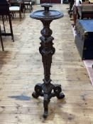 Victorian heavily carved candle stand on triform base, 122cm.