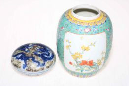 Chinese pottery vase decorated with floral design and Chinese lidded ink box with dragon decoration.