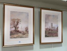 Two framed watercolours of churches, 38.5cm by 27cm.