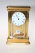 Rapport of London brass and glass mantel clock with enamel dial.