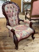 Victorian style open armchair in buttoned tapestry fabric.