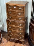 Neat walnut tallboy chest of seven drawers, 95.5cm by 43cm by 32cm.