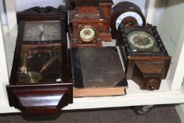 Three vintage mantel clocks, two wall clocks, bible, etc.