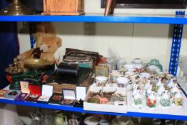 Oriental ginger jars, Danbury Mint bells, costume jewellery, binoculars, bible, globe, toilet case,