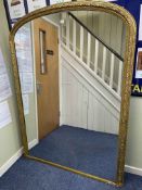Victorian gilt framed arched top overmantel mirror, 180cm by 132cm overall.