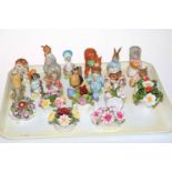 Thirteen Beswick Beatrix Potter characters and seven Aynsley china posies.