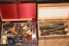 Two small boxes of tools including Rabone spirit levels, various miniature planes, E.