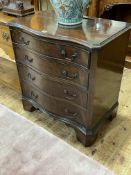 Mahogany serpentine front chest of four long drawers on shaped bracket feet, 79cm by 76cm by 48cm.