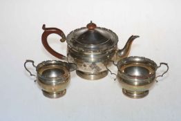 Silver three piece tea service with shaped rims, Birmingham 1927.