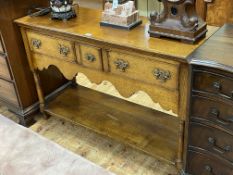 Titchmarsh & Goodwin style oak three drawer potboard dresser, 76cm by 117cm by 40cm.